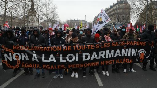 France’s controversial immigration law sparks massive protest in Paris