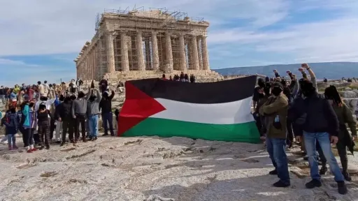 Palestinian flag unfurles at the historical Acropolis Temple and the Monument to the Unknown Soldier in Athens