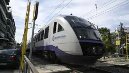 Woman killed by train at level crossing