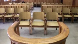 Thirteen Turkish nationals appear in court over Glyfada murders, weapons possession charges