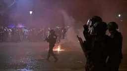 French interior minister under fire for calling Paris Saint-Germain fans 'barbarians'