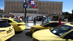 Taxi Drivers march to Parliament in Athens amid ongoing strike