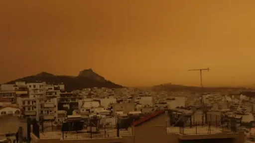 Cloudy skies across Greece with African dust and local rain