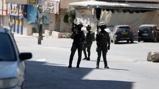Israel faces mounting pressure at home and abroad