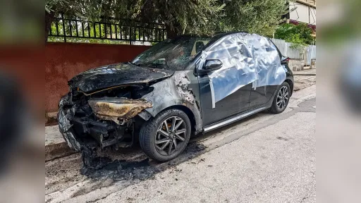 Greek navy officer wanted over arson attacks targeting former partners